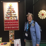 Yours truly by my Yule Tree Advent Calendar 'debut'  - in National NonWoven booth